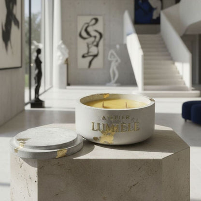 Interior décor arrangement featuring beeswax candle in cement jar from Atelier Lumiele