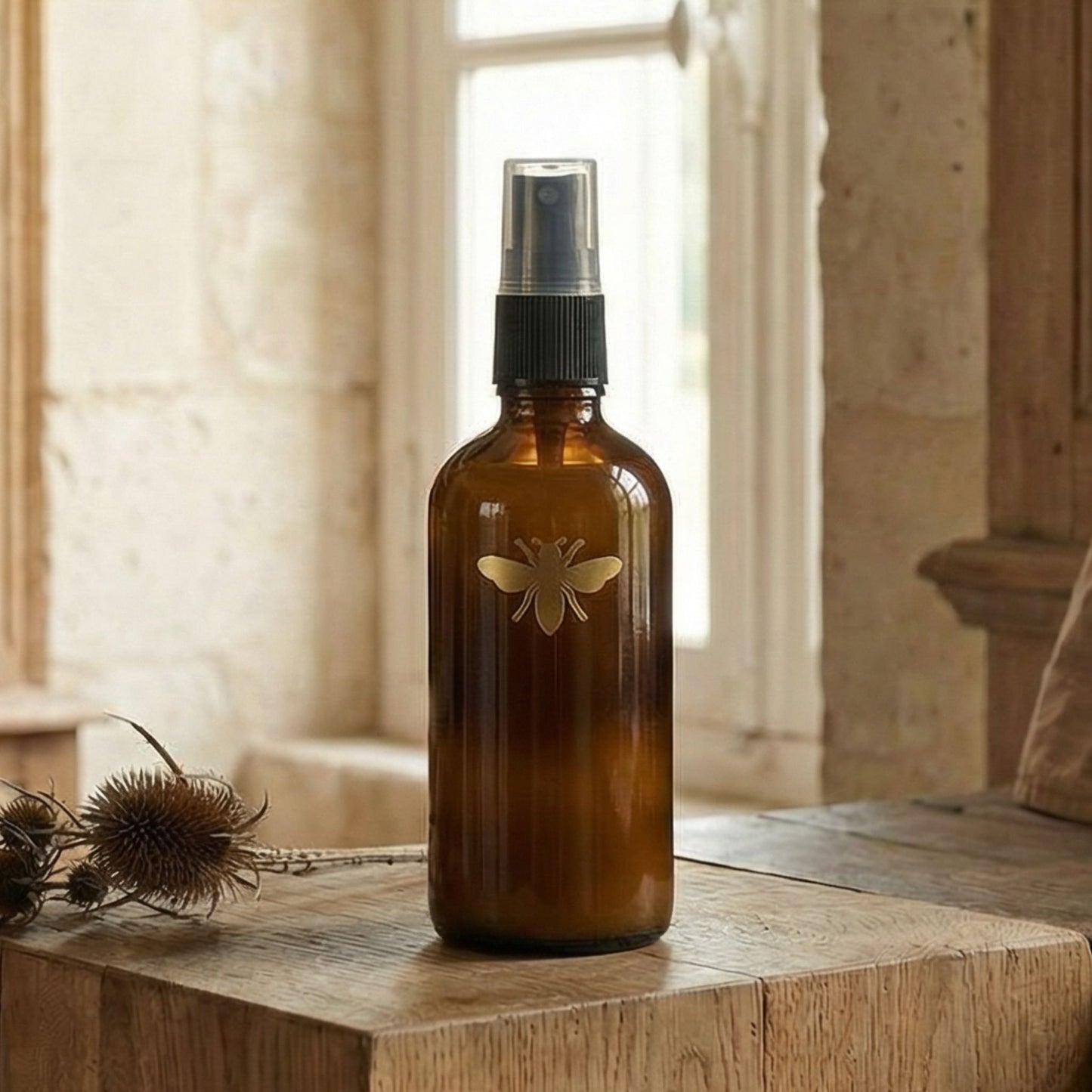 Close-up detail of mini interior perfume spray bottle from Atelier Lumiele
