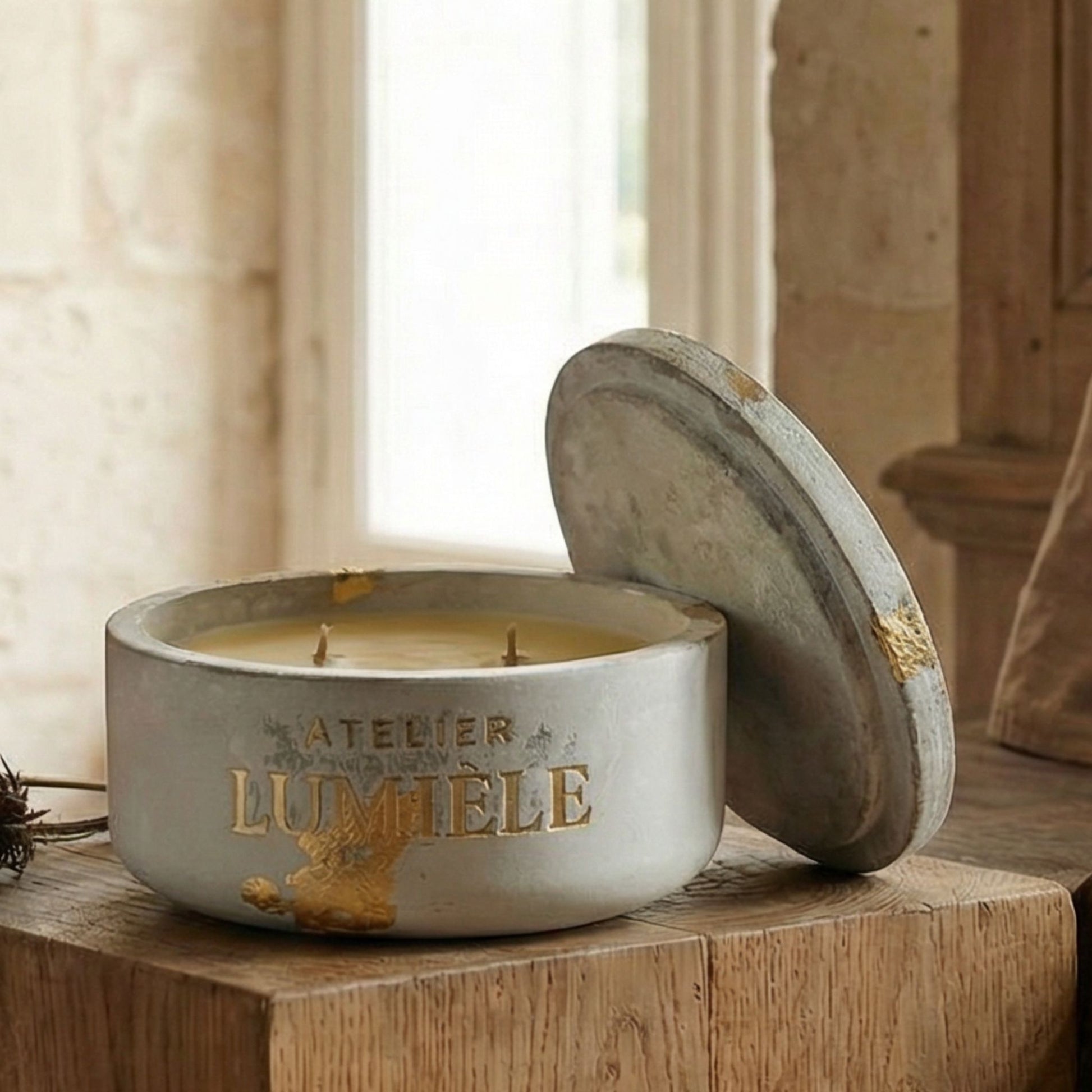 Close-up detail of repellent blend candle surface in cement jar from Atelier Lumiele