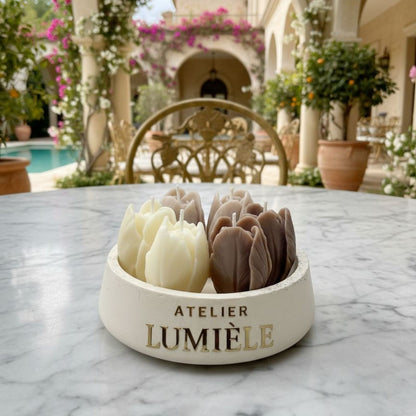 Gypsum jar tulip candle placed in blooming spring garden from Atelier Lumiele